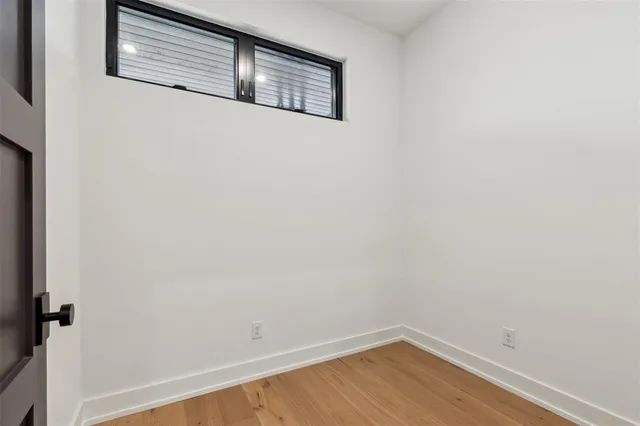 a view of small space with wooden floor