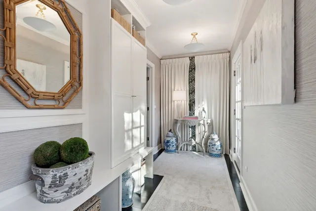 a dining table with a mirror and a table