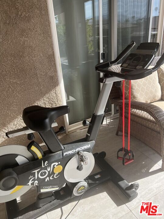 Undisclosed Address Desert Hot Springs, CA 92240 - Photo 18 of 44 a room with gym equipment