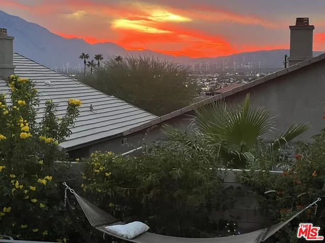 a view of a lake from a balcony