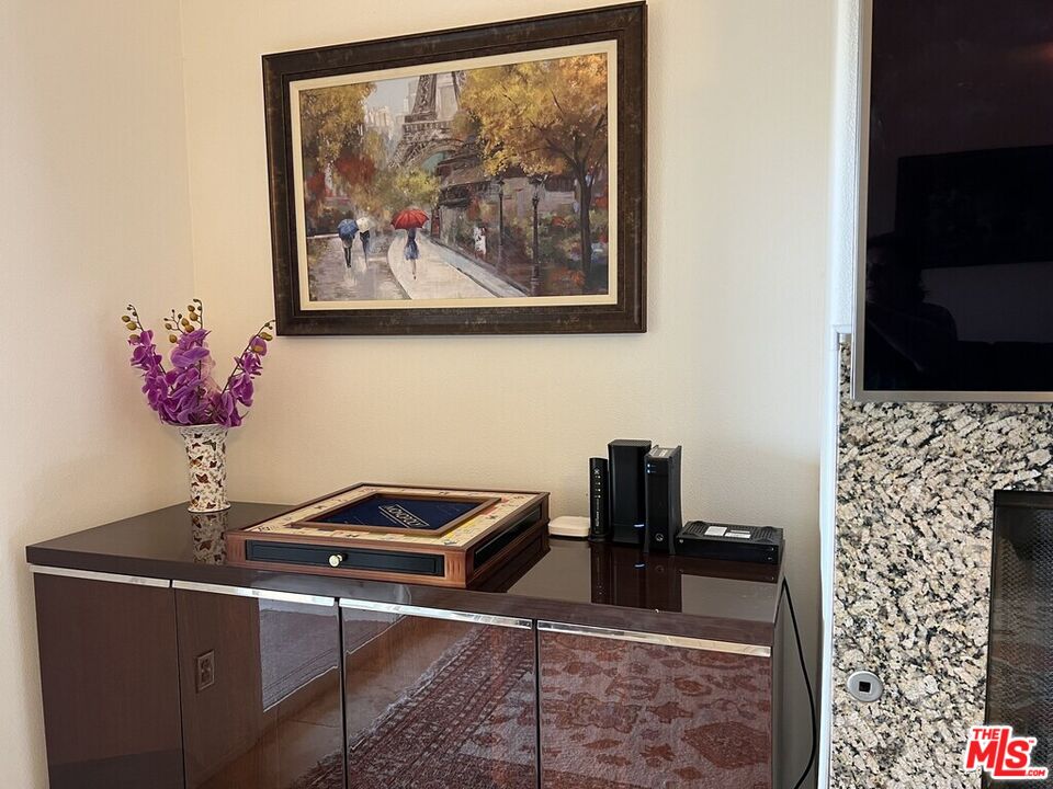 Undisclosed Address Desert Hot Springs, CA 92240 - Photo 35 of 44 a living room with furniture and flowers