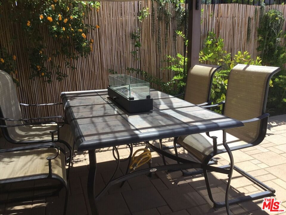 Undisclosed Address Desert Hot Springs, CA 92240 - Photo 6 of 44 a view of a outdoor seating area with furniture