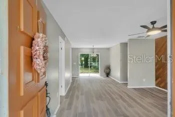 a view of entryway with wooden floor