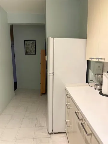 a view of room with gym equipment