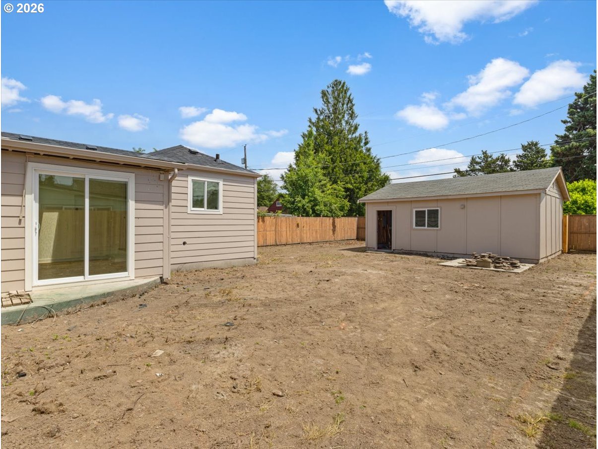 440 25th Avenue Longview, WA 98632 - Photo 19 of 27 a view of a house with a yard and garage