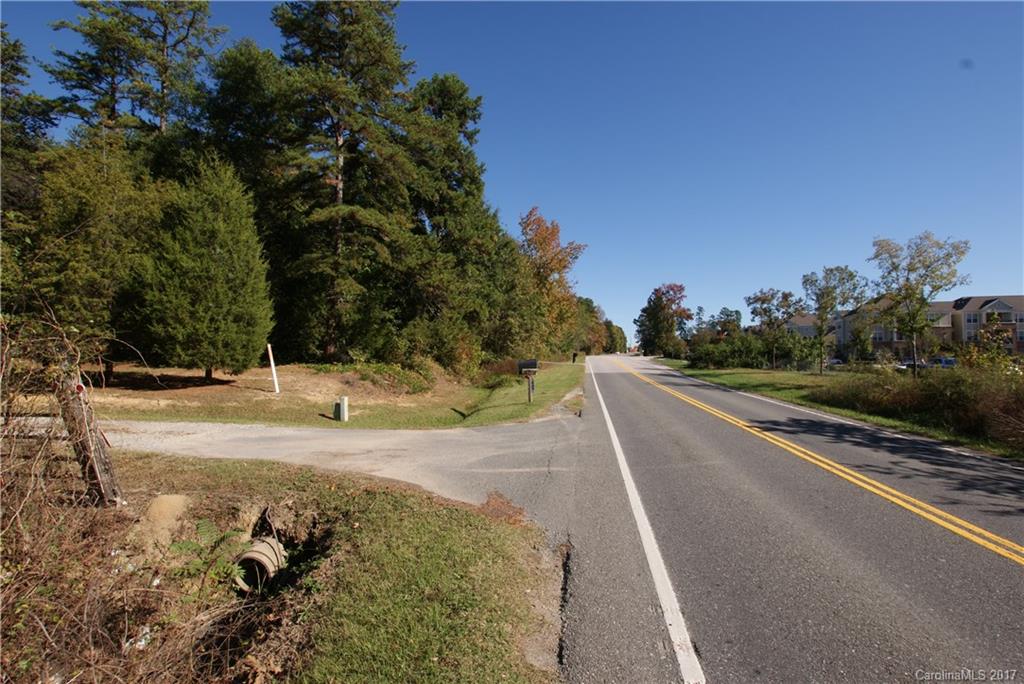 2625 Pleasant Road Fort Mill, SC 29708 - Photo 1 of 12 a view of a road with a yard