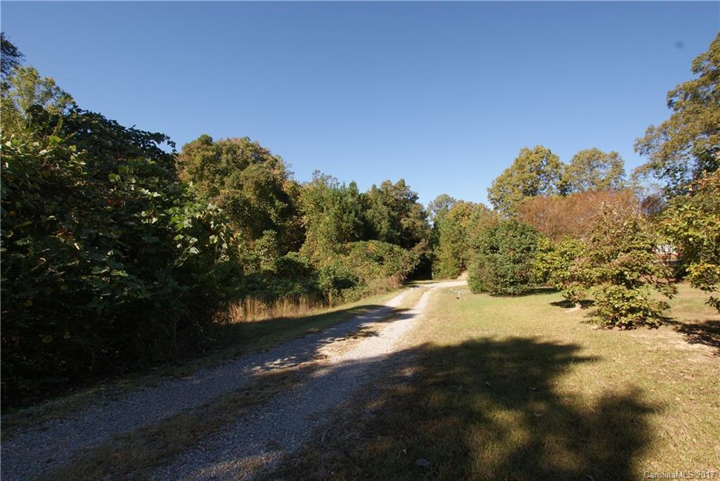 2625 Pleasant Road Fort Mill, SC 29708 - Photo 6 of 12 a view of a yard with a tree