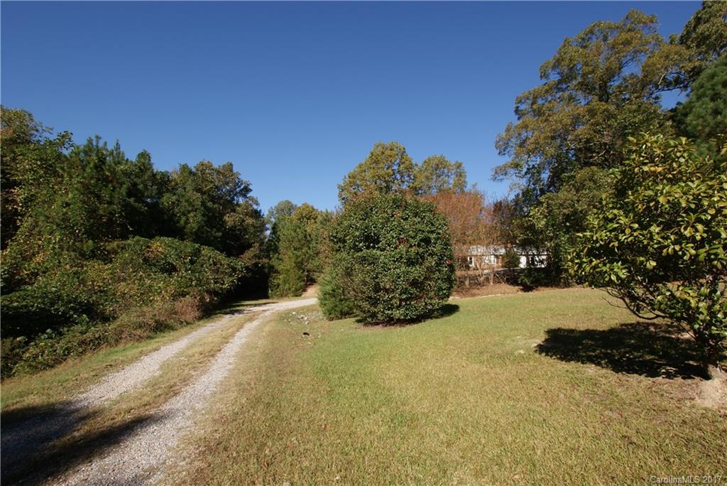 2625 Pleasant Road Fort Mill, SC 29708 - Photo 10 of 12 a view of a road with a house in the background