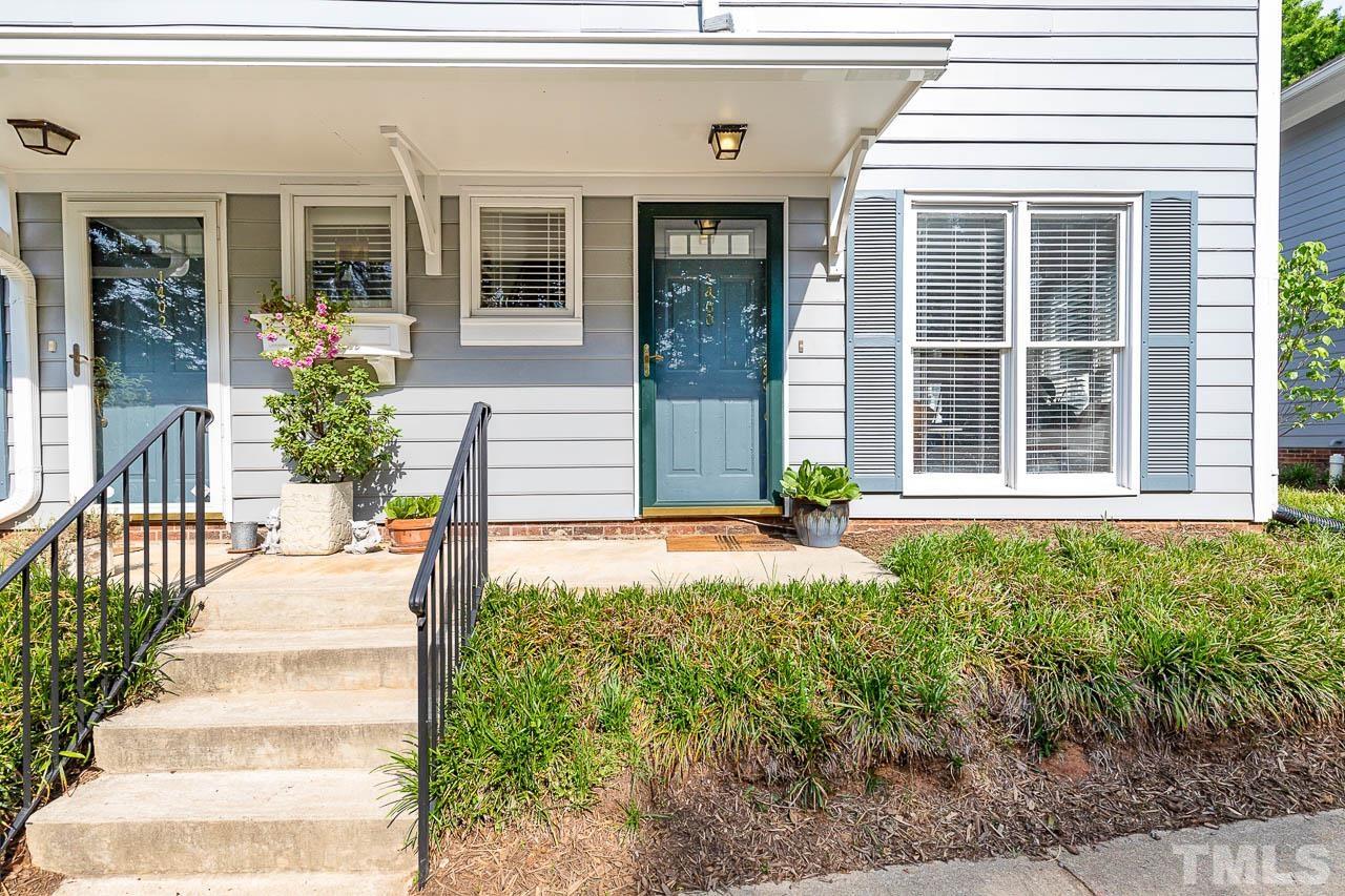 1400 Barton Pl Drive Raleigh, NC 27608 - Photo 2 of 25 a front view of a house with a yard