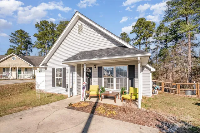 a view of house with a outdoor space