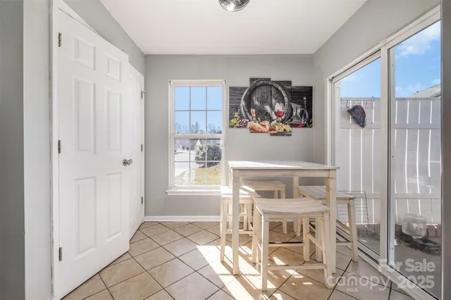 a view of a livingroom with furniture and window