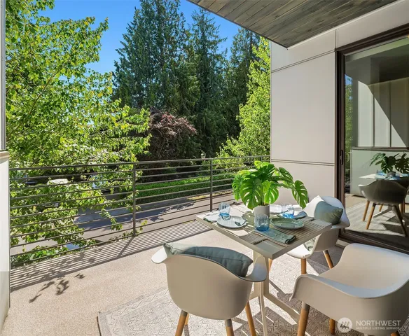 a view of a chairs and table in a patio