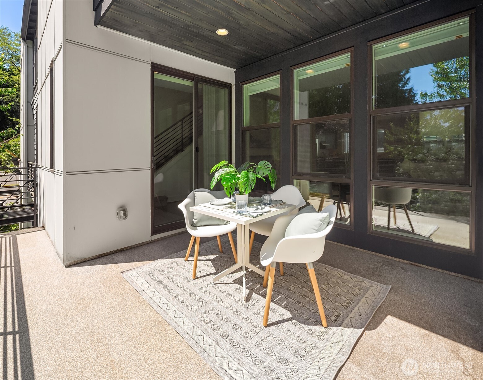 9604 Main Street, Unit C Bothell, WA 98011 - Photo 16 of 32 a outdoor space with a couch and chairs
