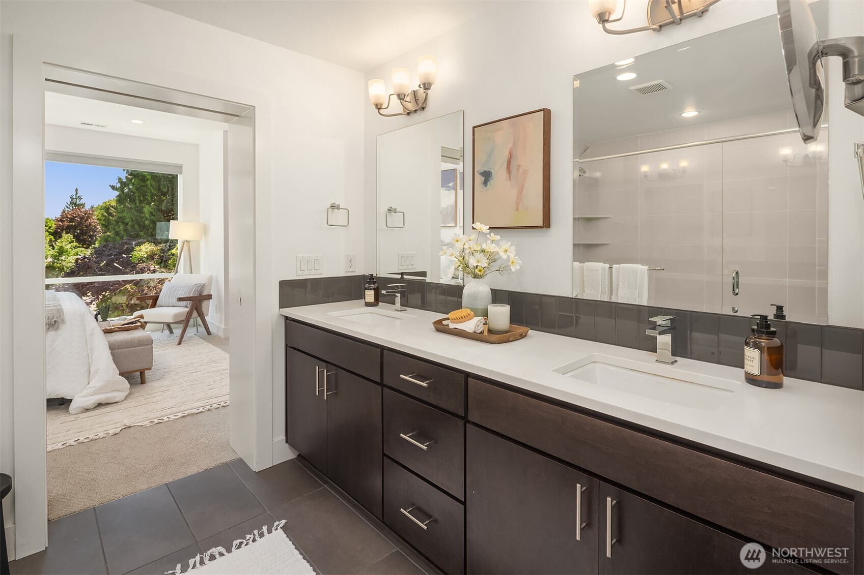 9604 Main Street, Unit C Bothell, WA 98011 - Photo 21 of 32 a bathroom with a sink double vanity and a mirror