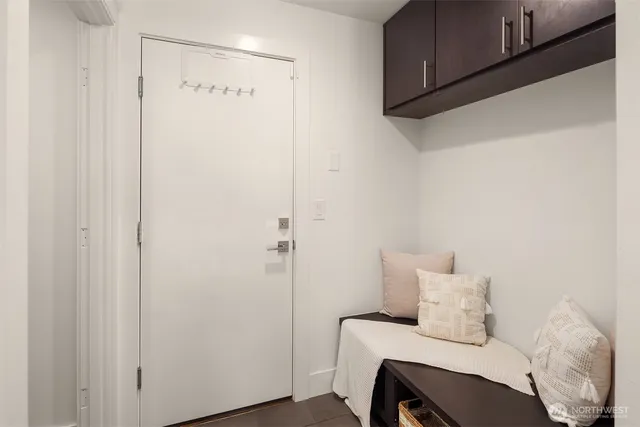 a bedroom with a bed and a cabinets