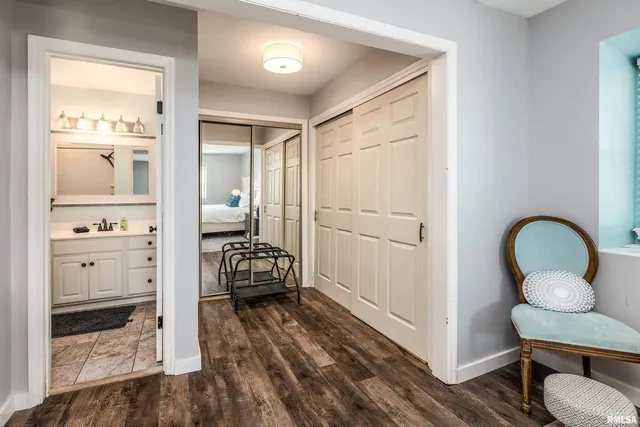 a bedroom with a bed and a couch