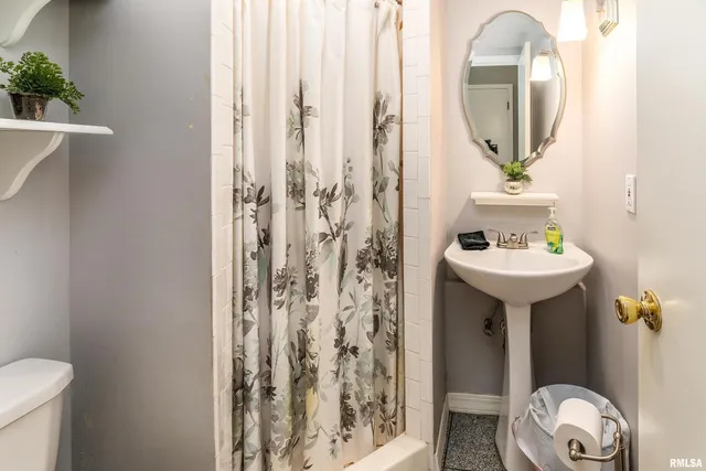 a living room with a couch and a table