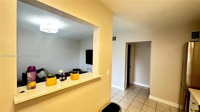 a bathroom with a tub and a sink