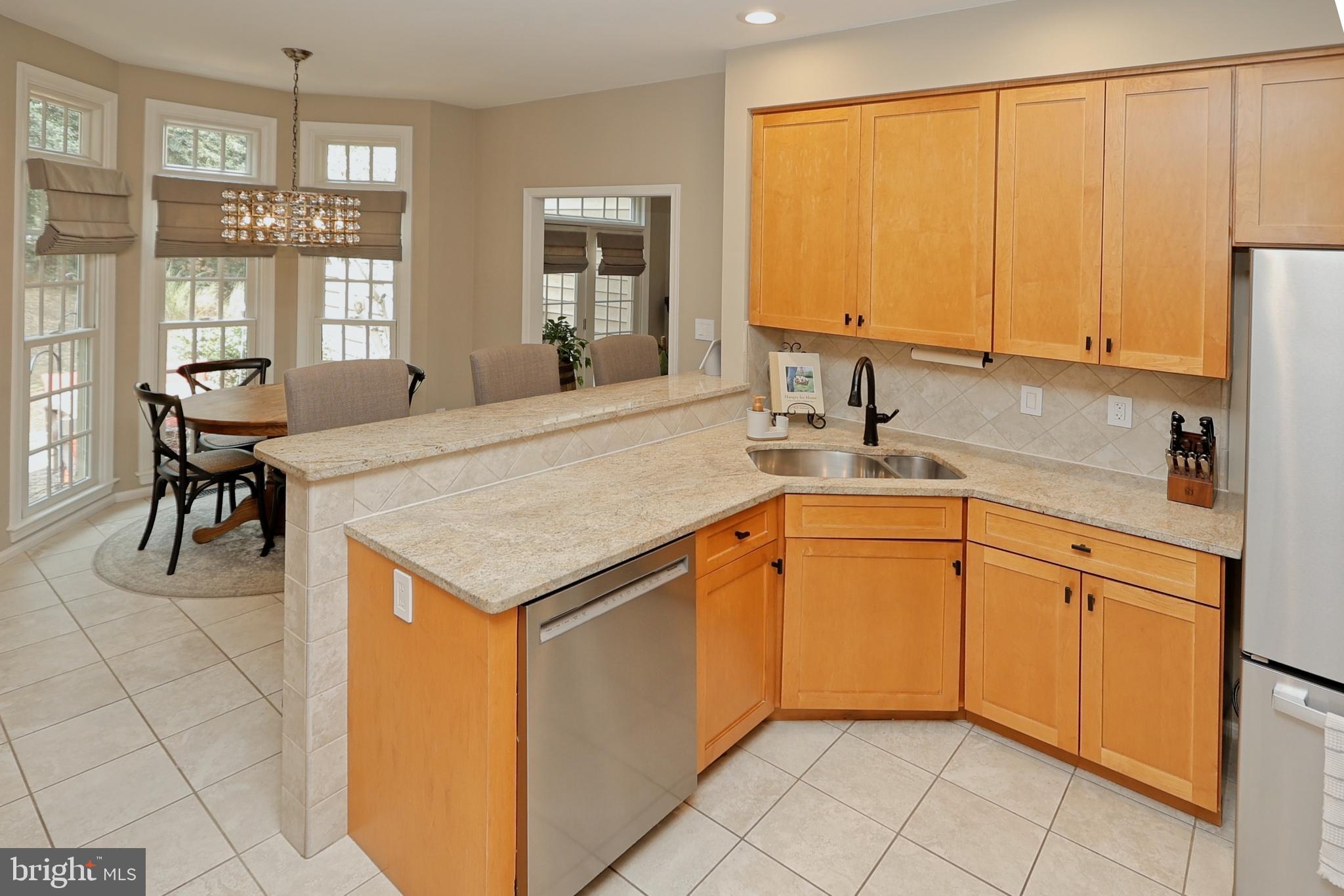 11423 Hollow Timber Way Reston, VA 20194 - Photo 13 of 68 Granite backsplash, countertops and bar