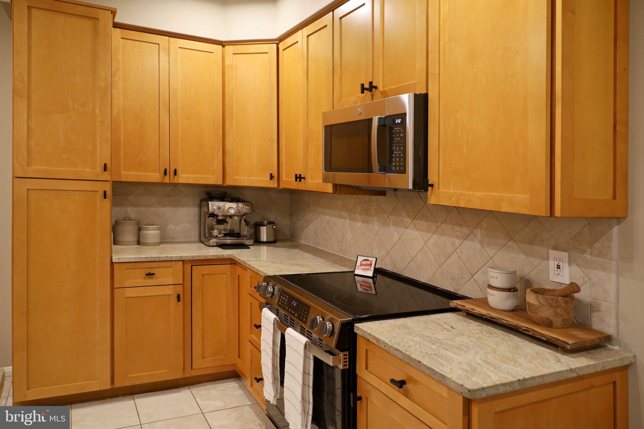 11423 Hollow Timber Way Reston, VA 20194 - Photo 14 of 68 Soft close 42" cabinet doors, lazy susan +pulls