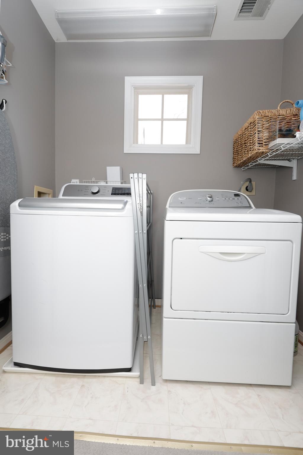 11423 Hollow Timber Way Reston, VA 20194 - Photo 30 of 68 a utility room with dryer and washer