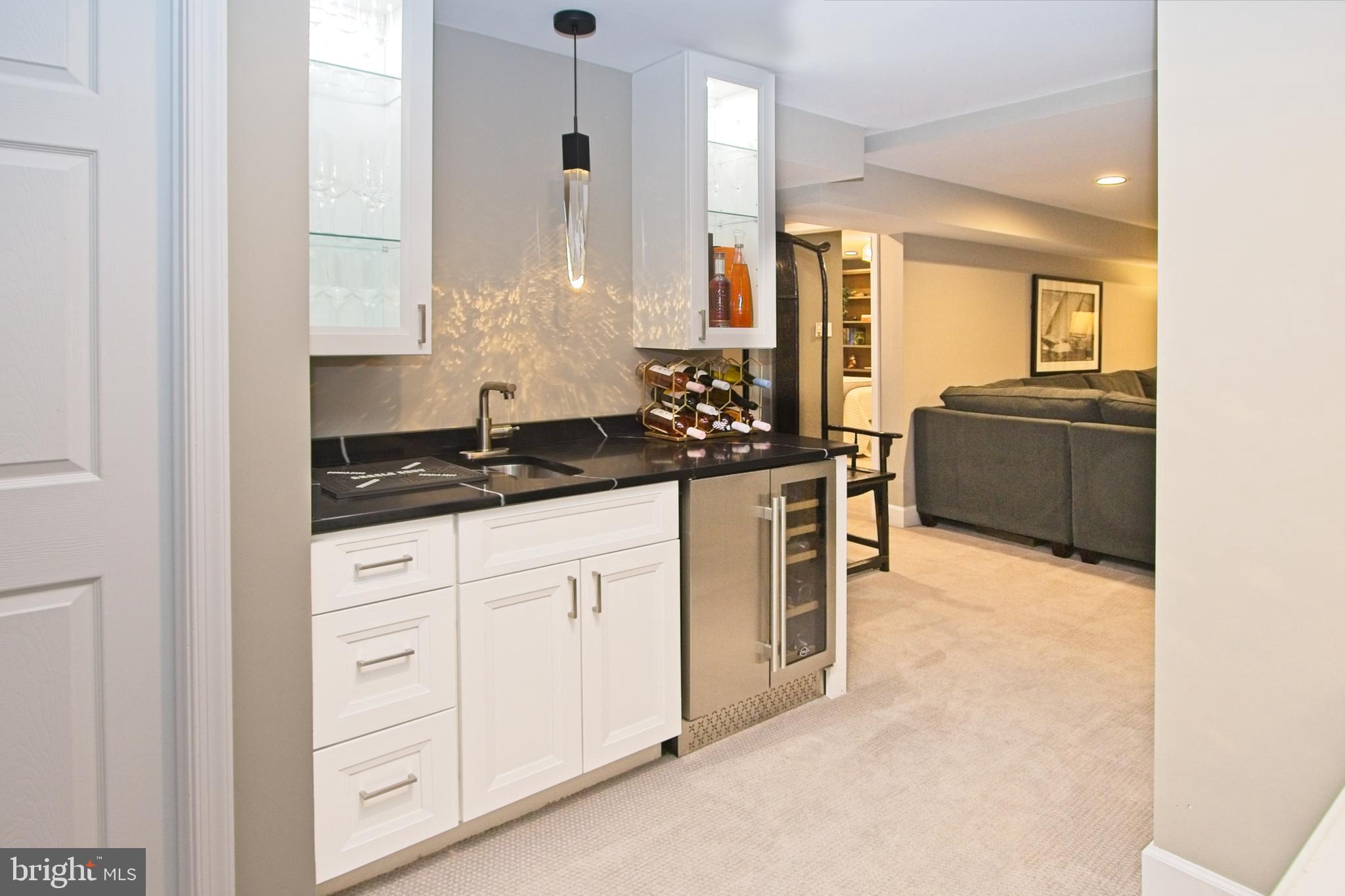 11423 Hollow Timber Way Reston, VA 20194 - Photo 36 of 68 Gorgeous, custom bar in rec room