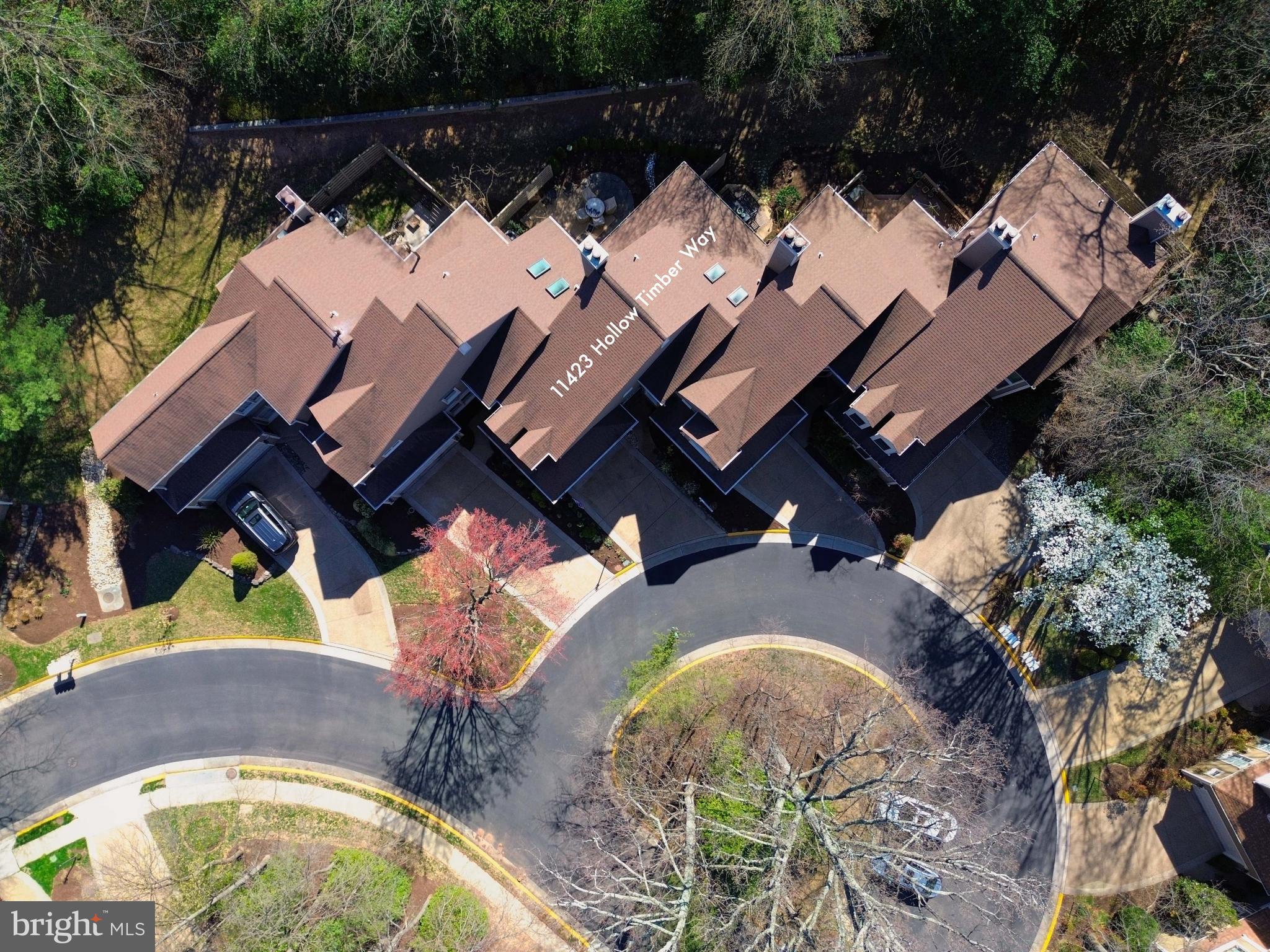 11423 Hollow Timber Way Reston, VA 20194 - Photo 53 of 68 an aerial view of a house with a swimming pool