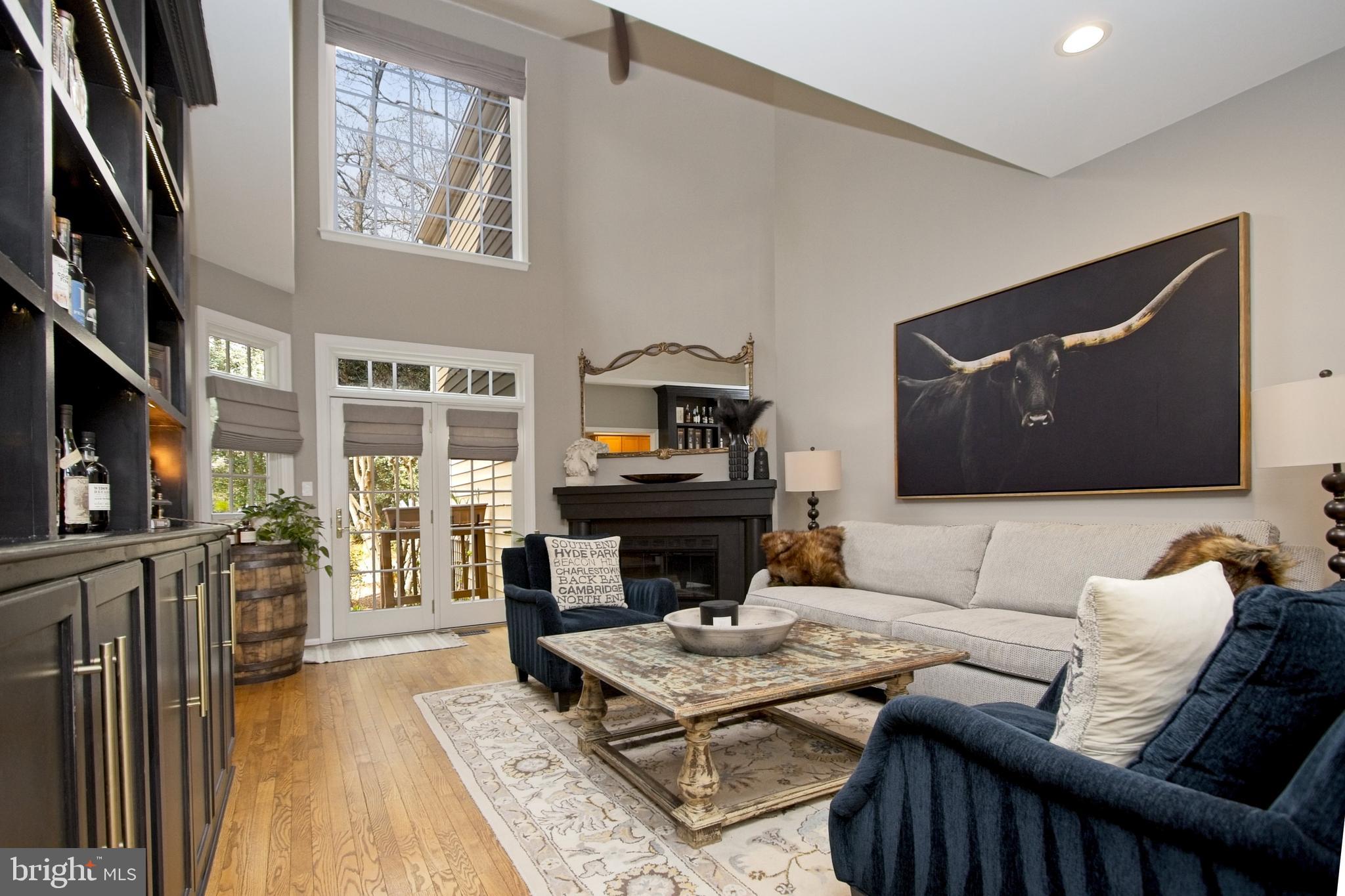 11423 Hollow Timber Way Reston, VA 20194 - Photo 6 of 68 a living room with furniture and a fireplace