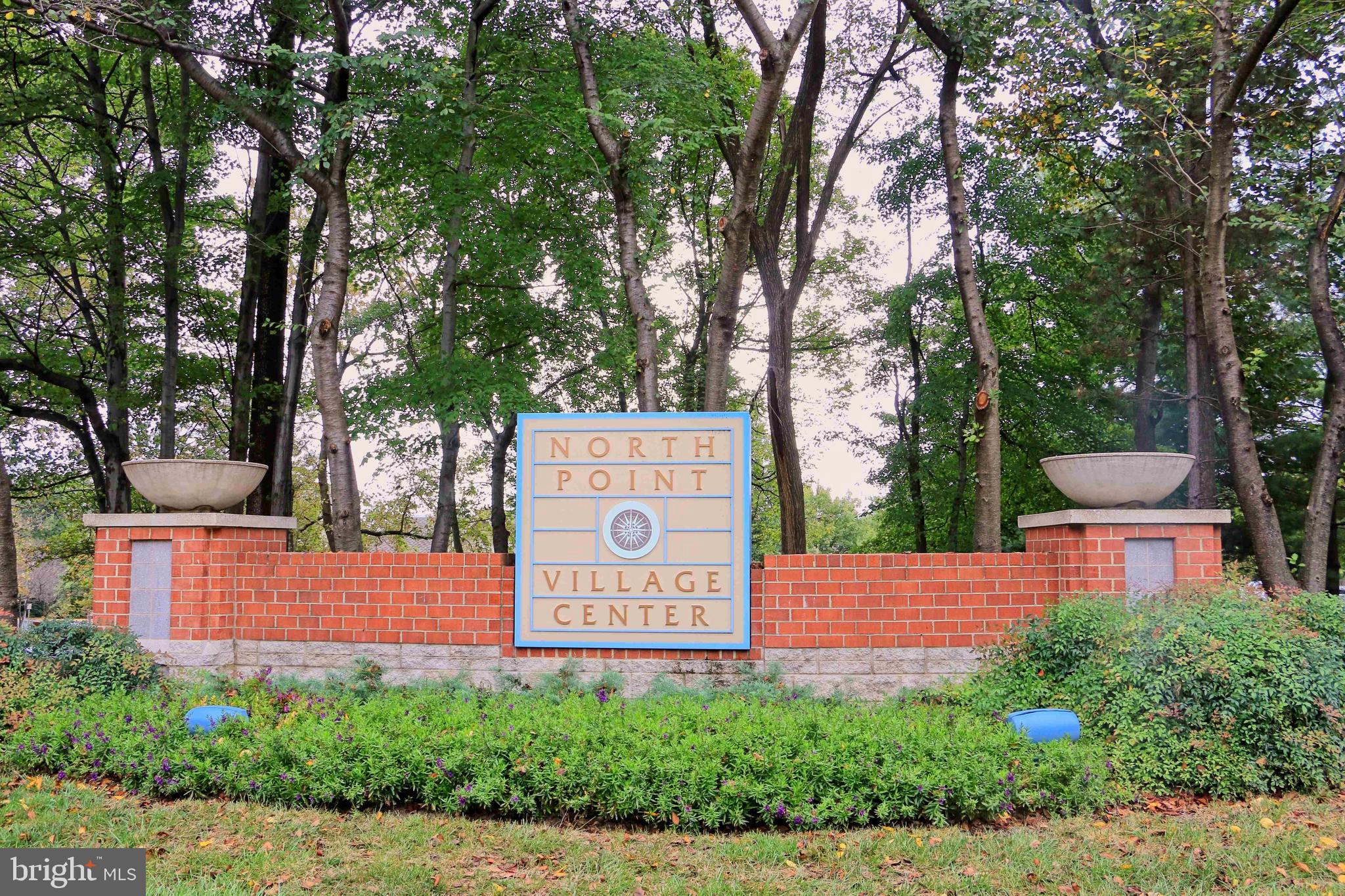 11423 Hollow Timber Way Reston, VA 20194 - Photo 61 of 68 a sign on the side of a building
