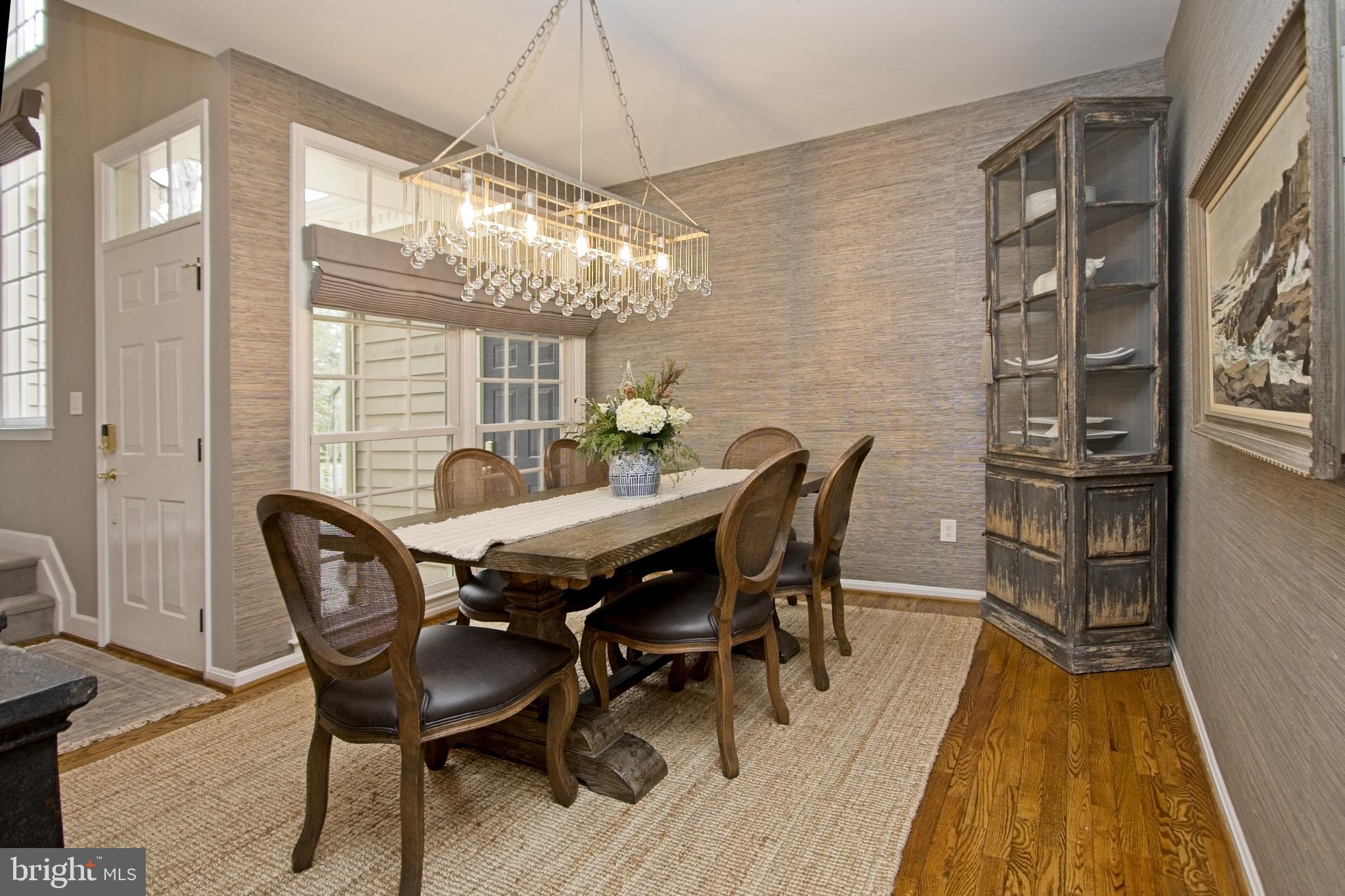 11423 Hollow Timber Way Reston, VA 20194 - Photo 9 of 68 a dining room with furniture and window