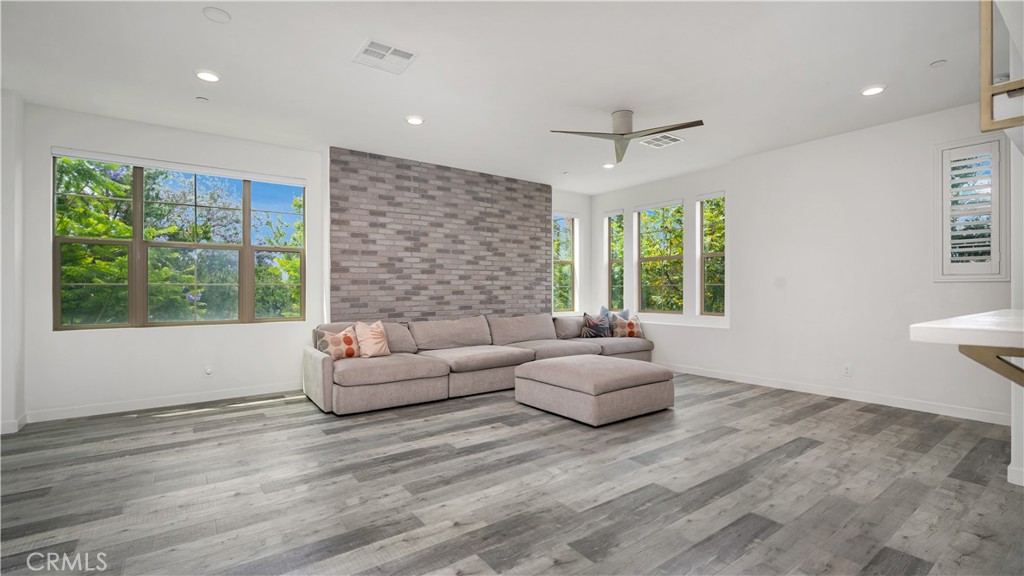 122 Fixie Irvine, CA 92618 - Photo 2 of 47 a living room with furniture and a large window