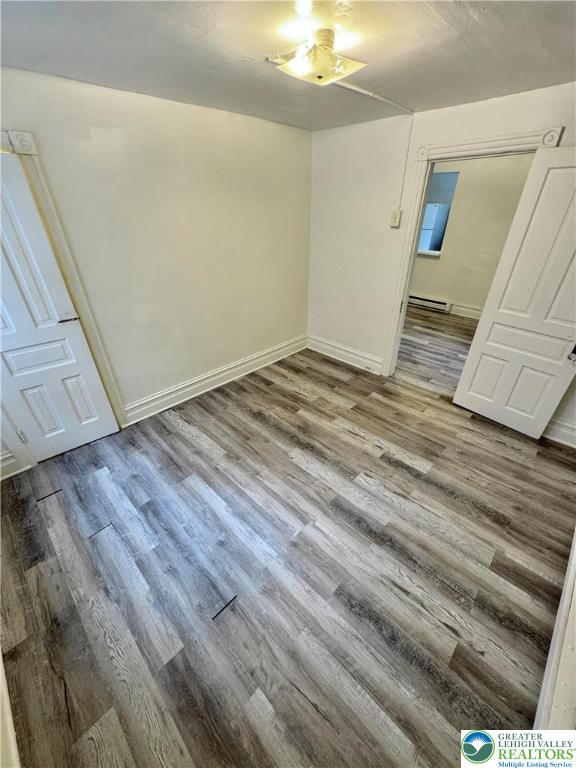 812 Chestnut Street, Unit B Allentown, PA 18101 - Photo 9 of 9 a view of empty room with wooden floor