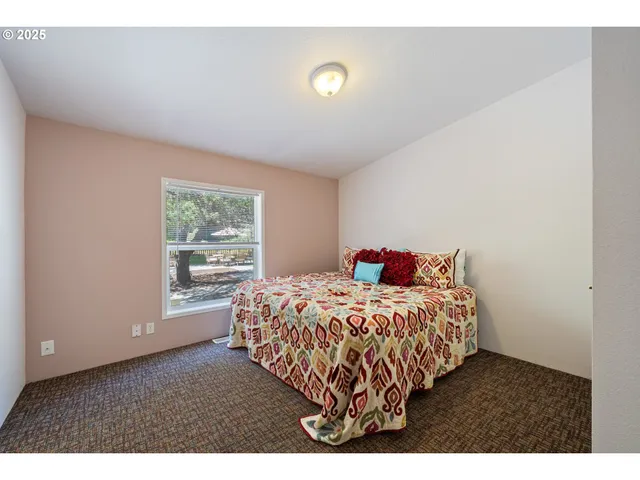 a bathroom with a sink toilet and mirror