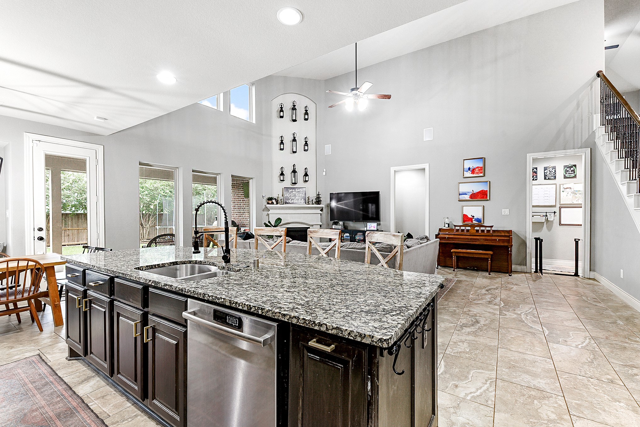 2939 Bobby Jones Road Katy, TX 77494 - Photo 14 of 50 a kitchen with sink cabinets and chandelier