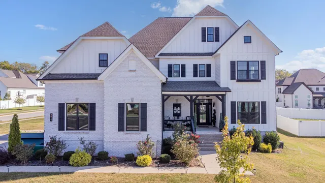 a view of hall way with furniture