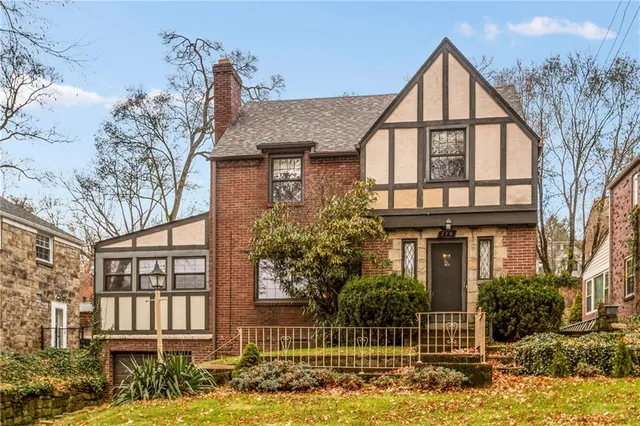 front view of a house with a street