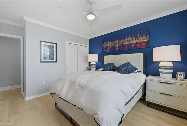 a bedroom with bed and window