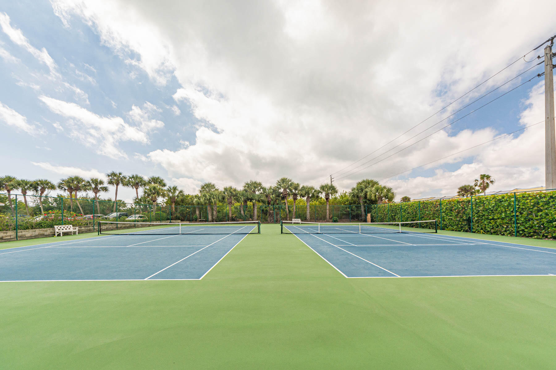 2700 North Hwy A1A, Unit 307 Hutchinson Island, FL 34949 - Photo 14 of 51 a view of an outdoor space and tennis court