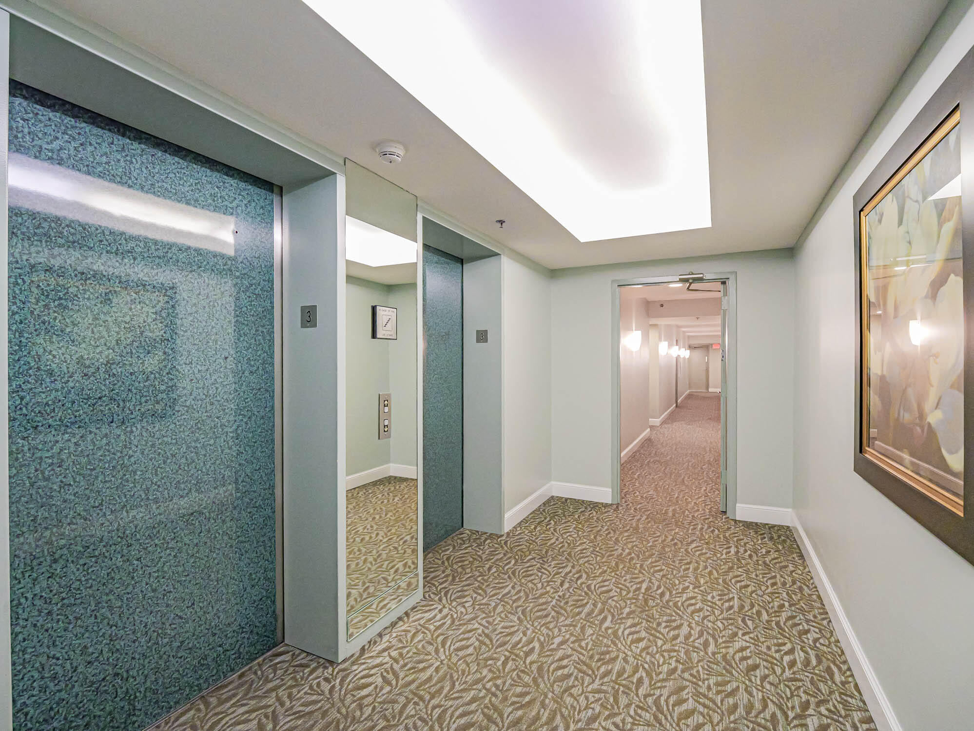 2700 North Hwy A1A, Unit 307 Hutchinson Island, FL 34949 - Photo 22 of 51 a bathroom with a glass door shower and a sink