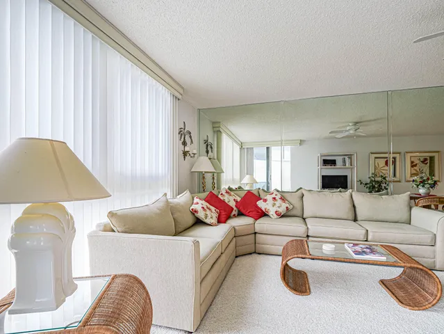 a kitchen with granite countertop a table and chairs