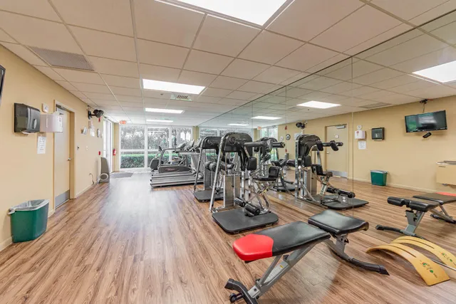 a view of a room with gym equipment