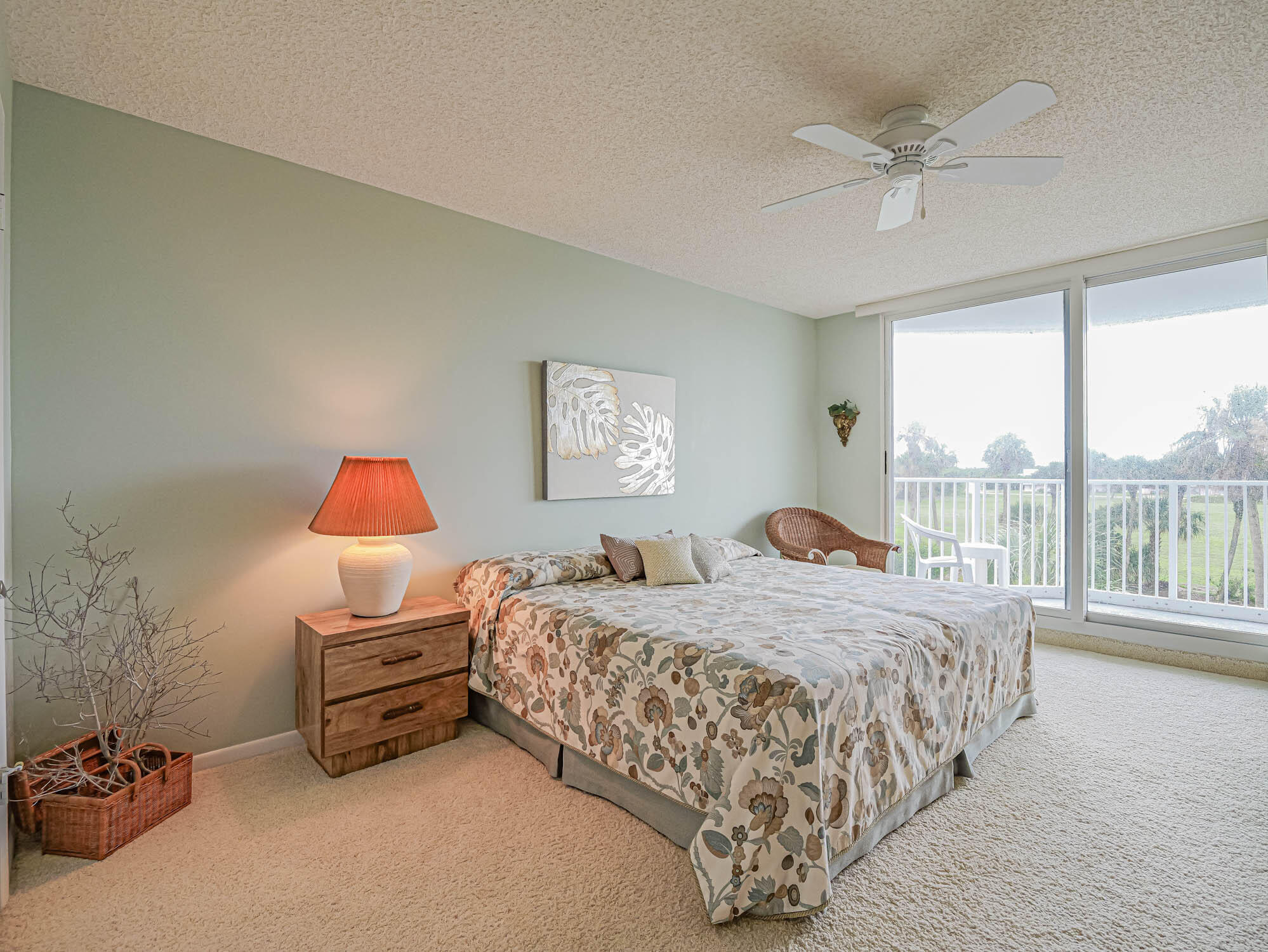 2700 North Hwy A1A, Unit 307 Hutchinson Island, FL 34949 - Photo 36 of 51 a bedroom with a bed and a large window