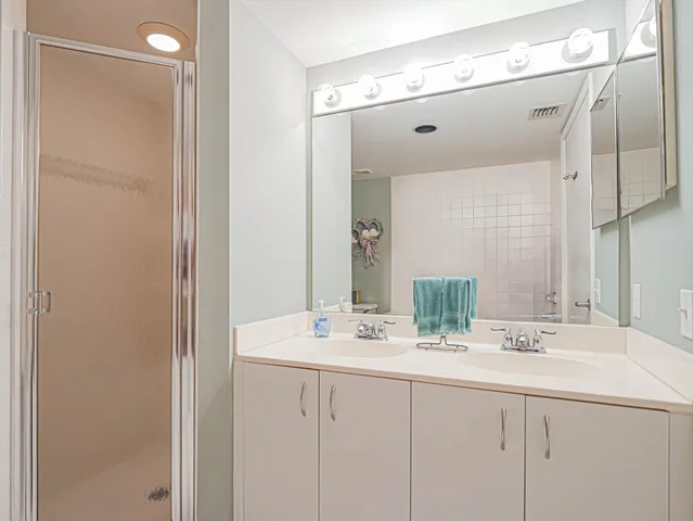 a bathroom with a bathtub and sink
