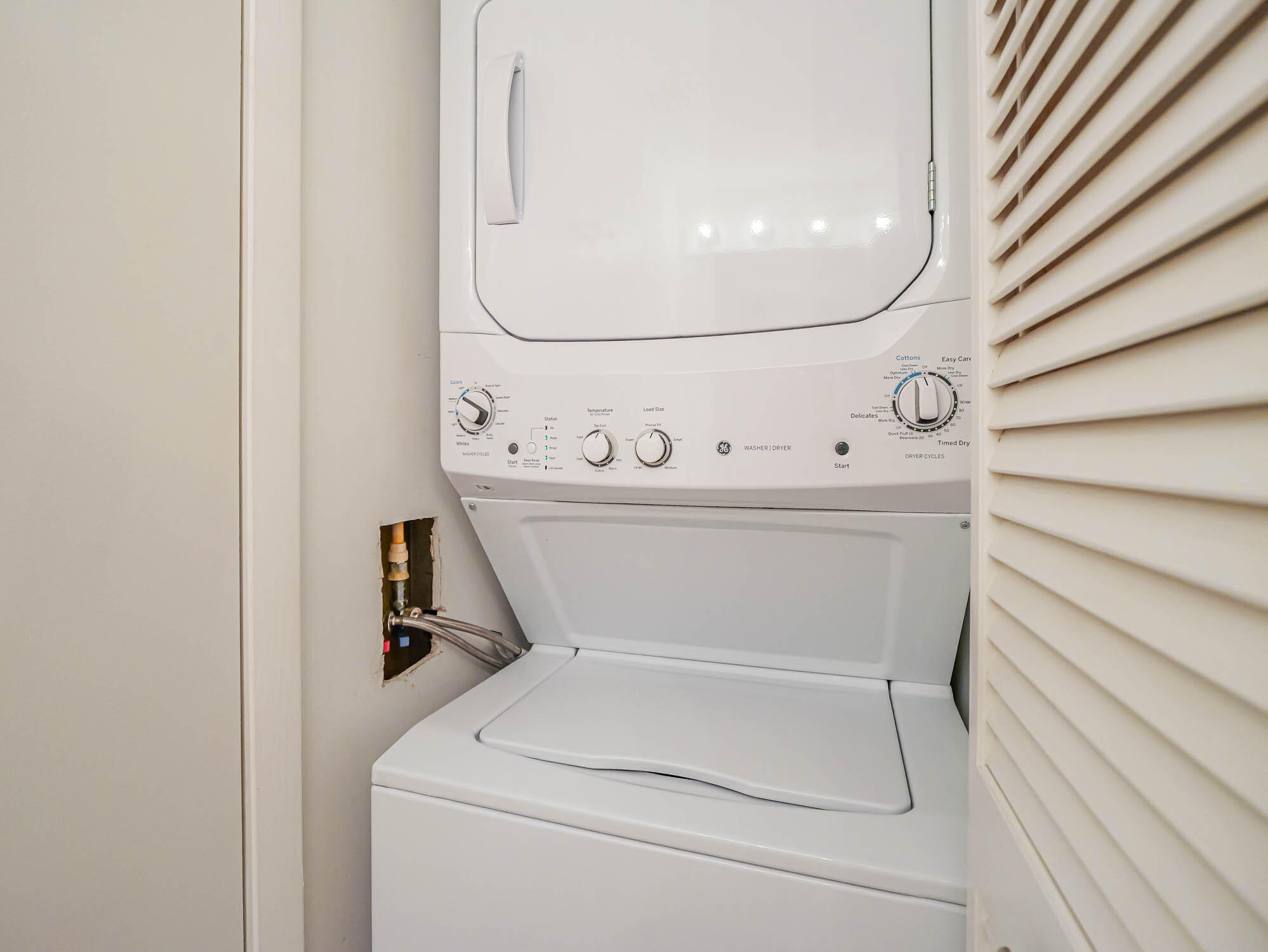 2700 North Hwy A1A, Unit 307 Hutchinson Island, FL 34949 - Photo 46 of 51 a utility room with dryer and washer