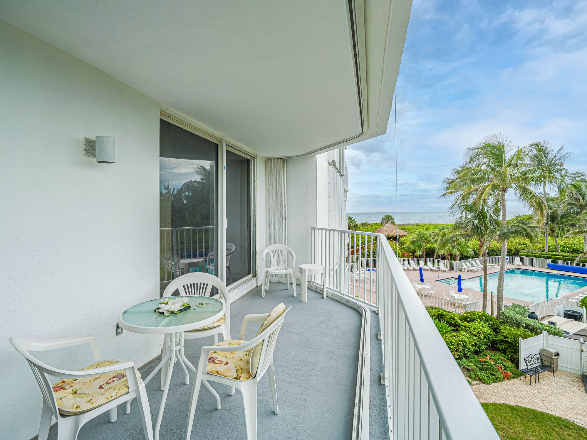 2700 North Hwy A1A, Unit 307 Hutchinson Island, FL 34949 - Photo 48 of 51 a view of a chairs and table in patio