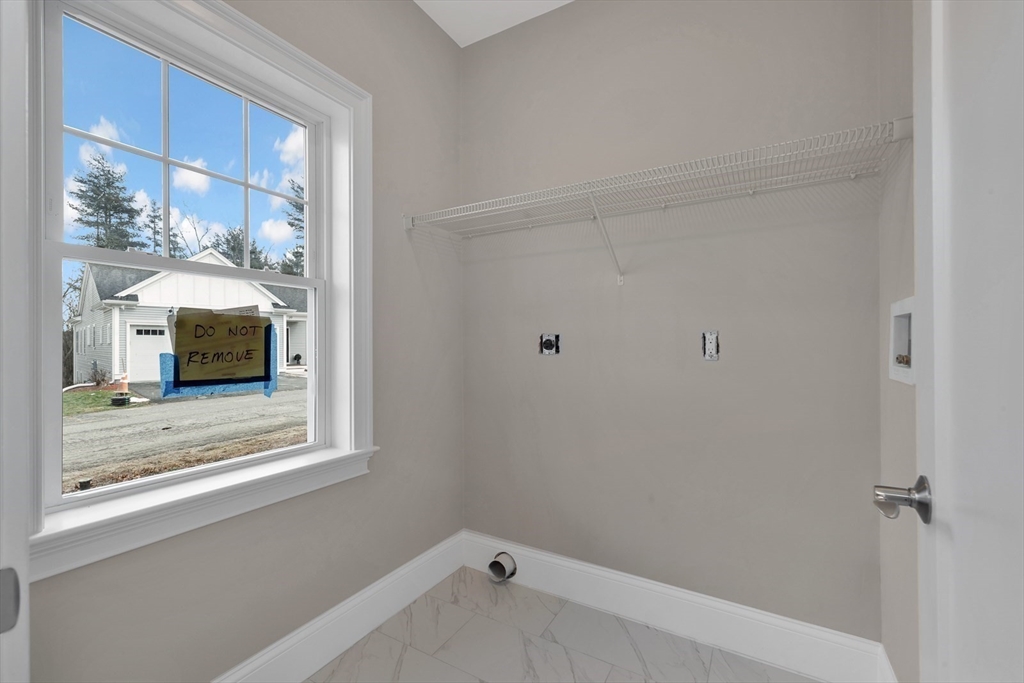 4 Weber Farm Road, Unit 4 Wrentham, MA 02093 - Photo 11 of 17 a bathroom with a bathtub and shower