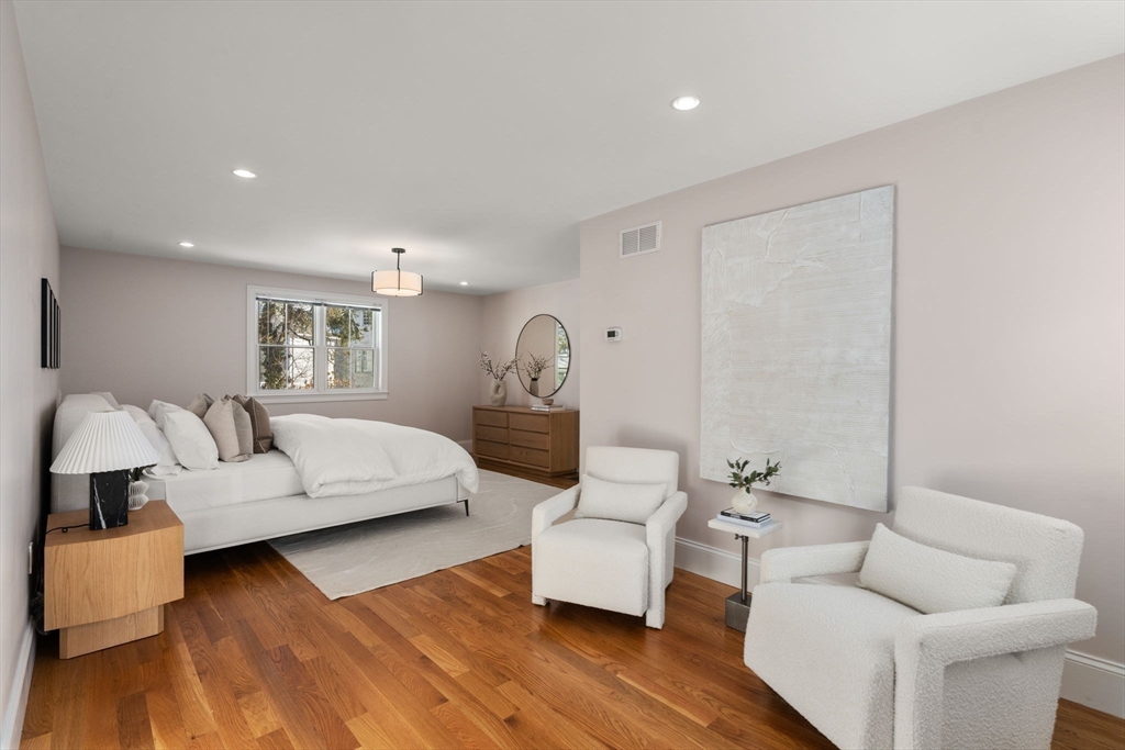 150 Country Club Road Newton, MA 02459 - Photo 16 of 33 a living room with furniture and a wooden floor