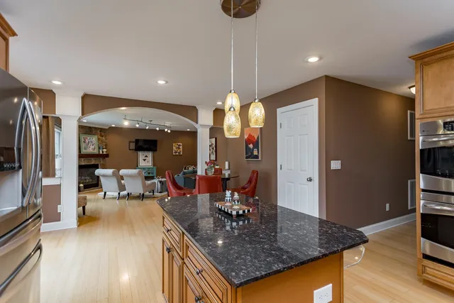 a fireplace with a clock on top of it