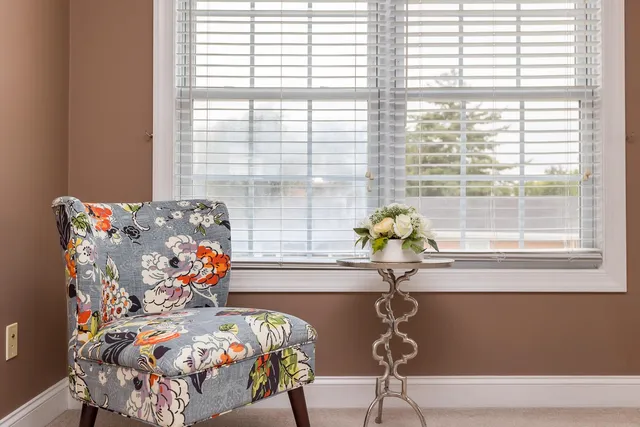 a view of a hallway with a window