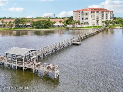 swimming pool view with a outdoor seating